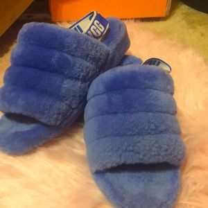 Blue furry ugg slides